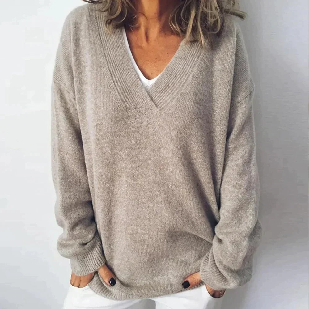 Women's casual V-neck long sleeve relaxed fit knit sweater, perfect for cozy fall & winter fashion or layering.