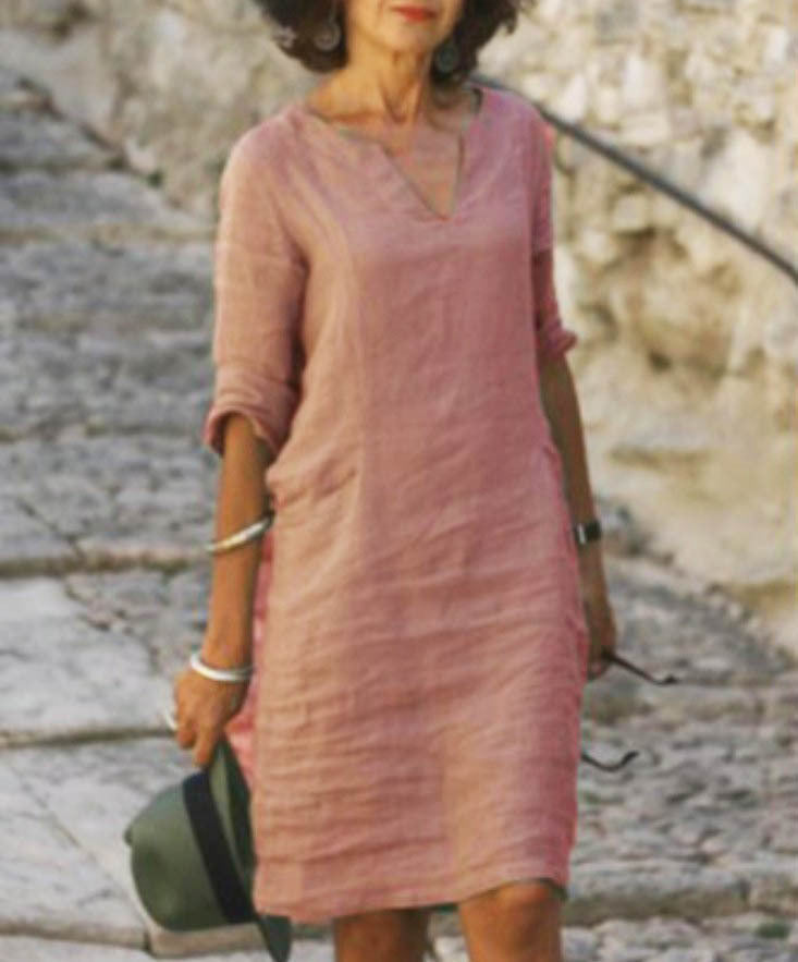 Fashionable women's casual V-neck midi dress, combining relaxed fit comfort with effortless style.
