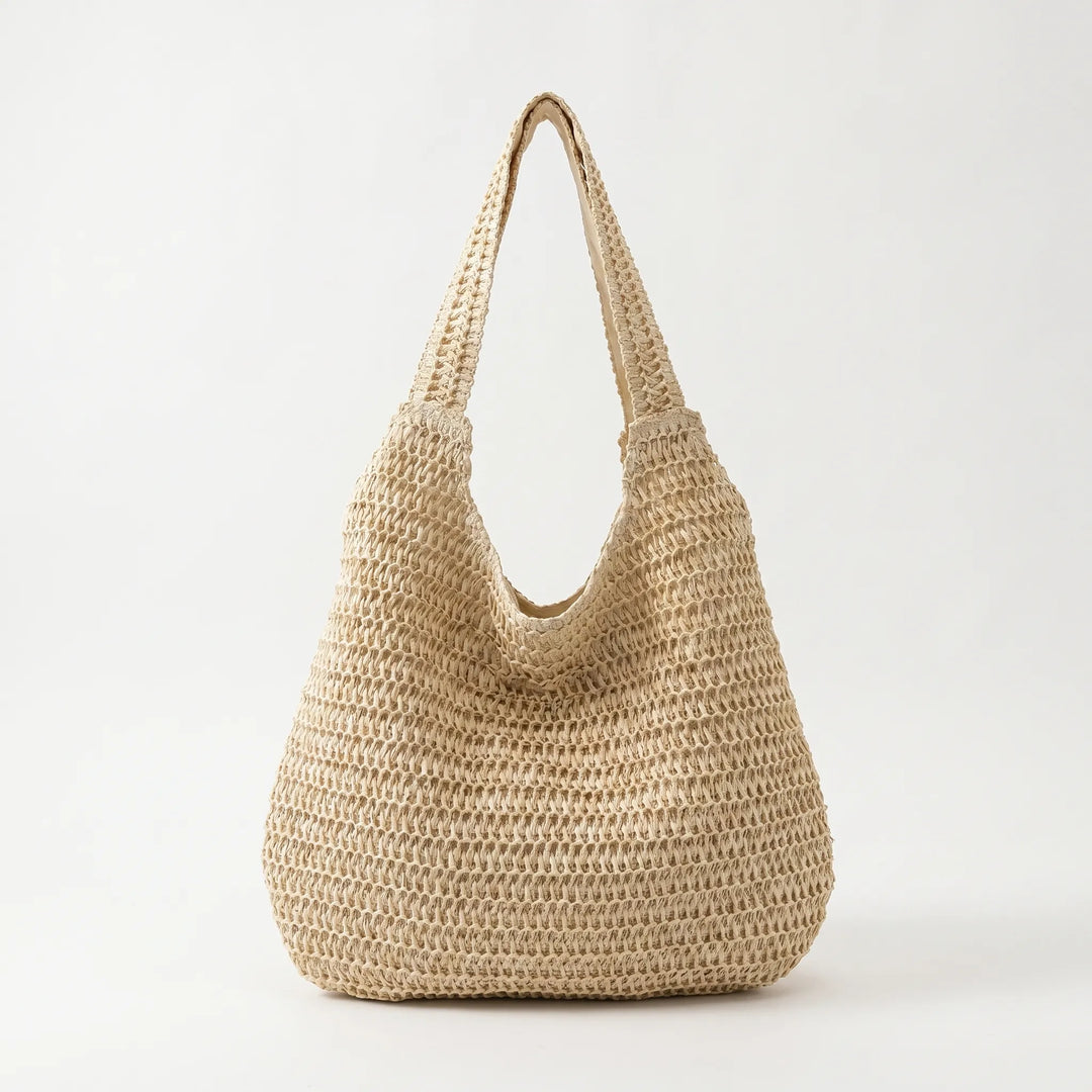 Stylish woven casual tote bag for women. Versatile shoulder carryall, great for summer, beach, or market trips.
