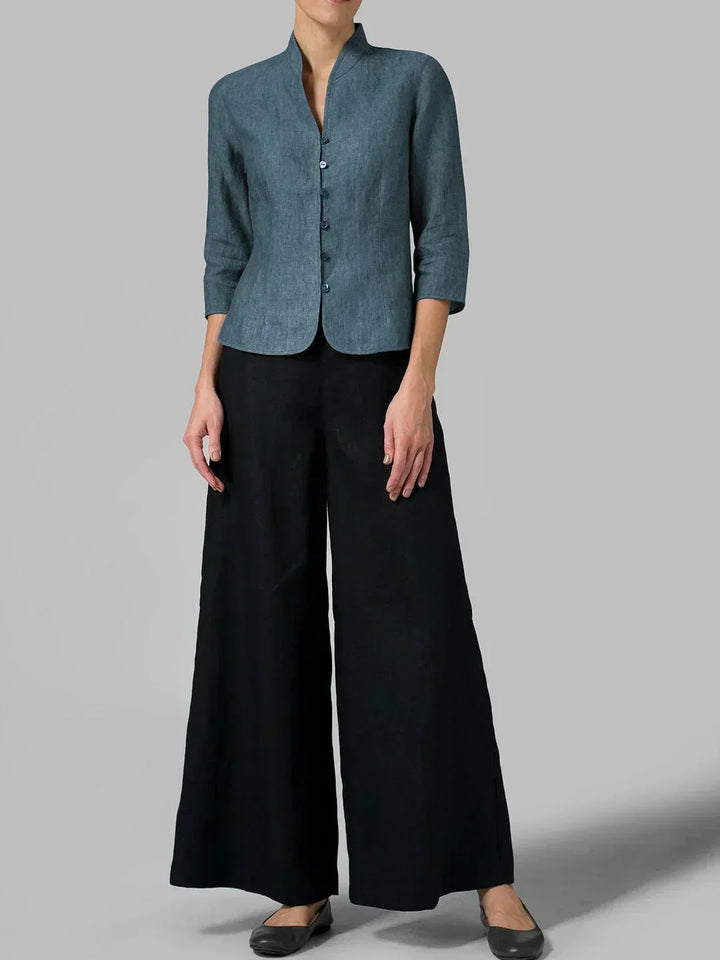 Modern women's relaxed fit 3/4 sleeve blouse with button front, offering effortless style for any occasion.