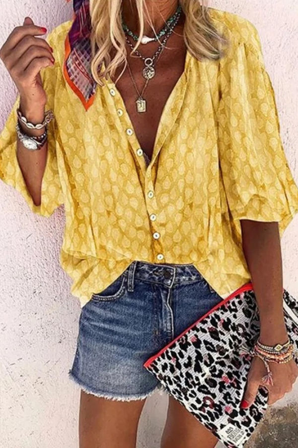 Casual chic women's button-up blouse, an airy summer top with a relaxed fit for everyday style.