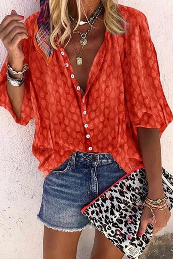 Comfortable women's airy button blouse, a stylish spring top with a relaxed fit, great for everyday wear.
