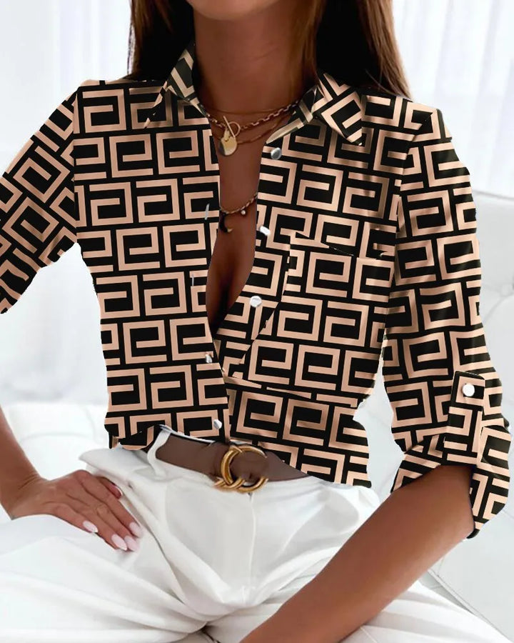 Versatile women's artistic print top, abstract design for chic casual or professional style.