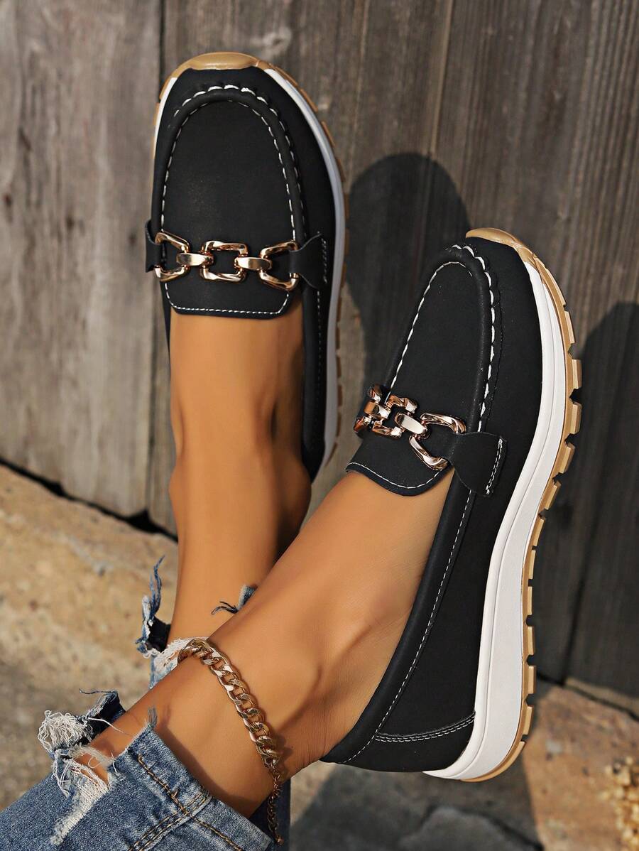 Women's casual elegant flatform shoes, designed as comfortable slip-ons with stylish gold chain details.