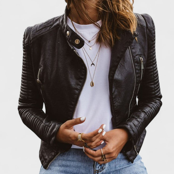 Women's chic black jacket, elegant outerwear for versatile fashion & professional wear. Sleek, all-season design.
