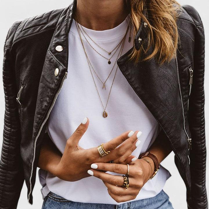 Chic women's black jacket with sleek design. Versatile outerwear for elegant, professional, and all-season style.