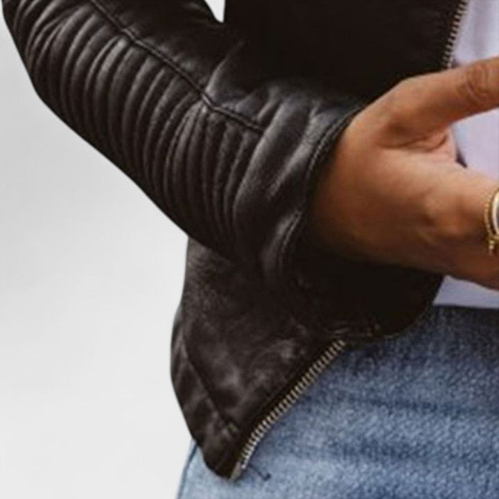 Sophisticated women's black jacket, offering chic elegance & effortless style. Versatile outerwear for all seasons.