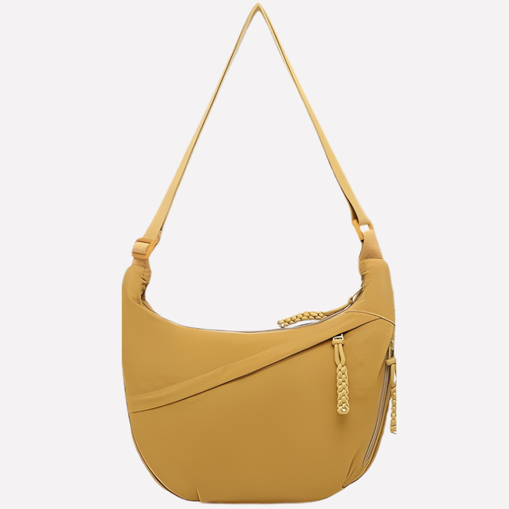 Women's designer crescent shoulder bag, featuring an intricate braided strap detail.