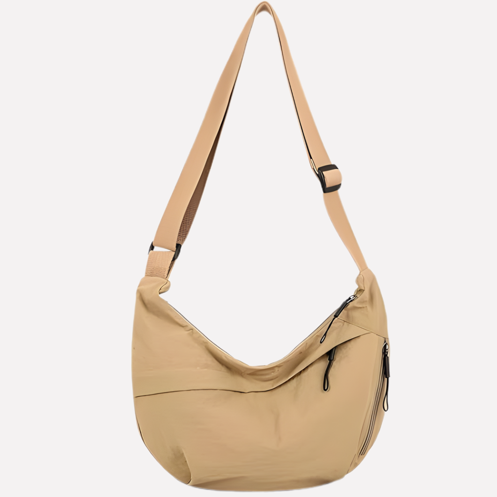 Sophisticated women's crescent bag with a distinctive braided shoulder strap, versatile purse.