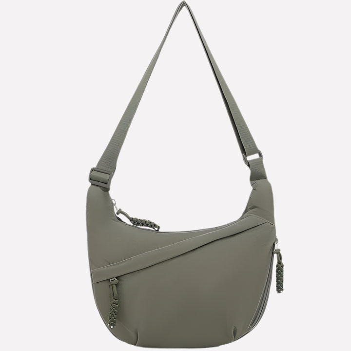 Casual chic crescent crossbody bag for women with an elegant braided shoulder strap.