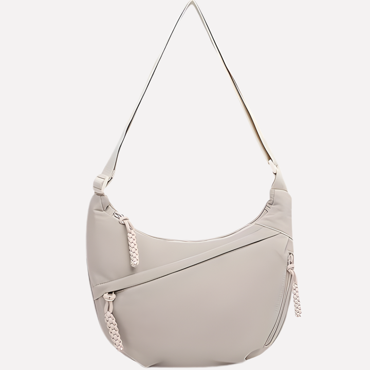 Elegant women's crescent purse, a versatile half-moon shape with a fashionable braided strap.