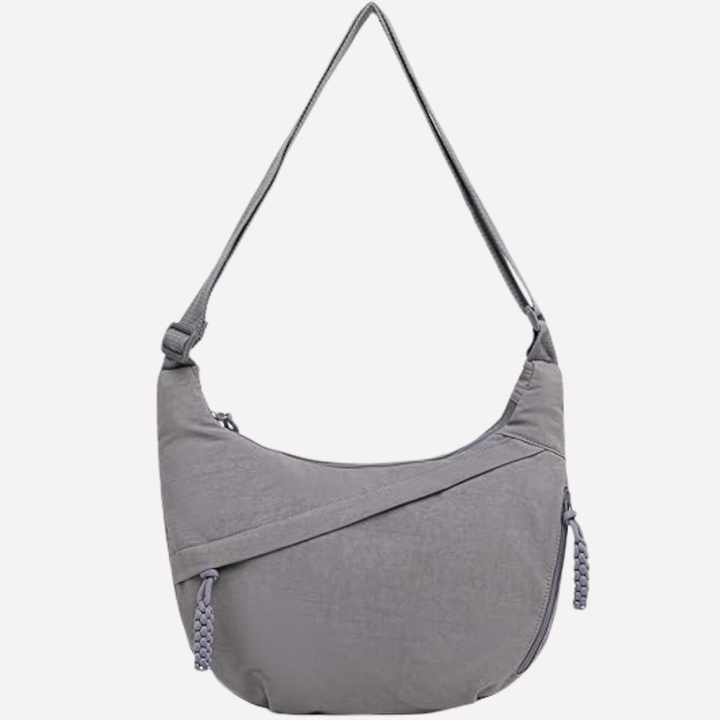 Women's stylish braided strap half-moon bag, an elegant crescent purse for any occasion.
