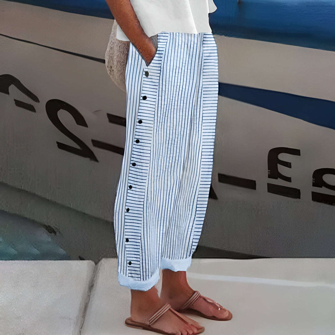 Women's chic cropped trousers with stylish stripe & button detail, perfect for work or casual spring wear.
