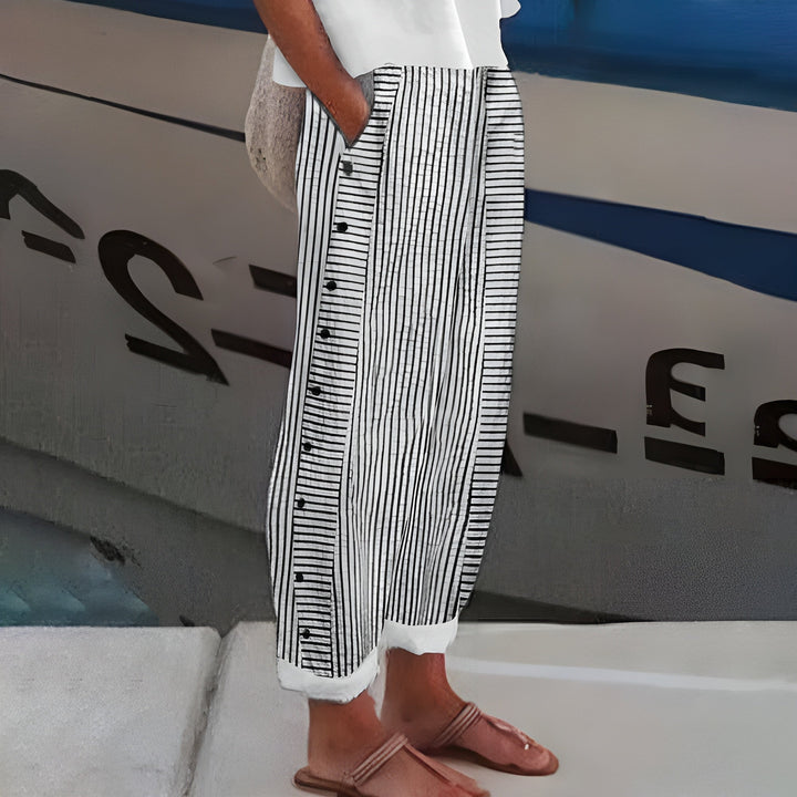 Elegant women's mid-rise straight leg cropped trousers with unique stripe & button details for versatile styling.