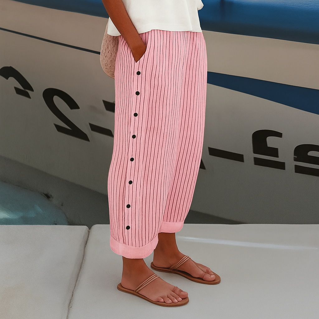 Stylish women's cropped pants with chic stripe and button design, offering elegant comfort for spring fashion.