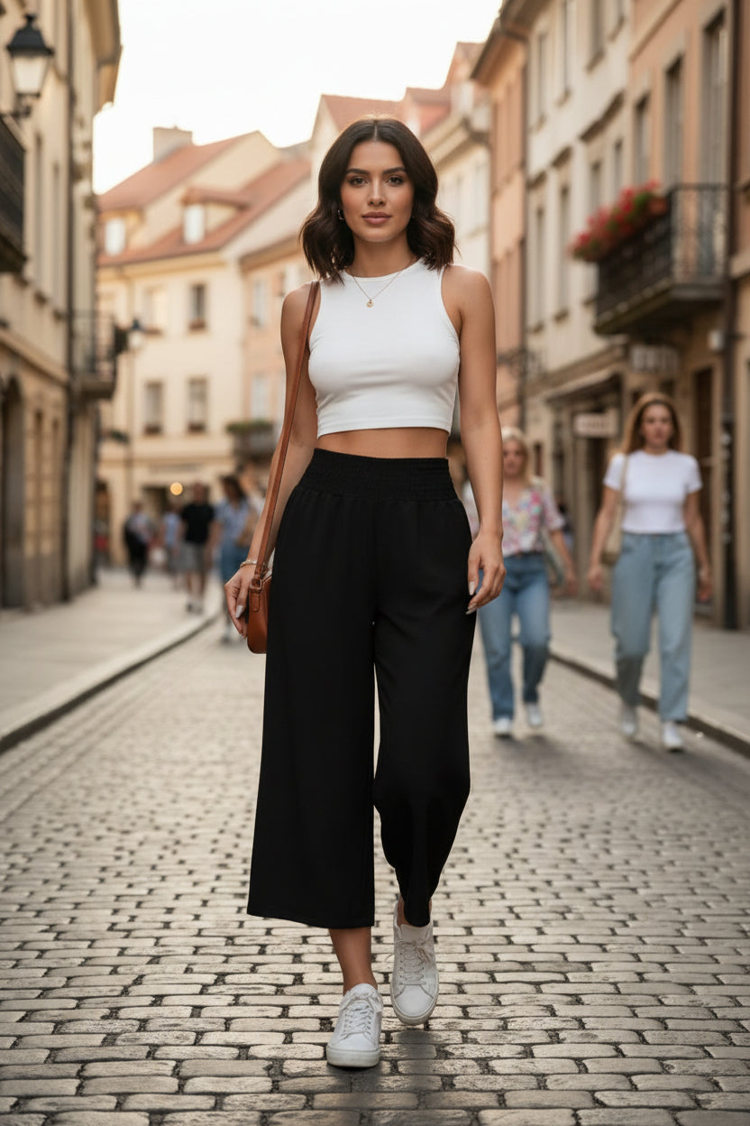 Comfortable women's cropped wide-leg pants with elastic waist. Relaxed fit summer bottoms for all-day comfort.