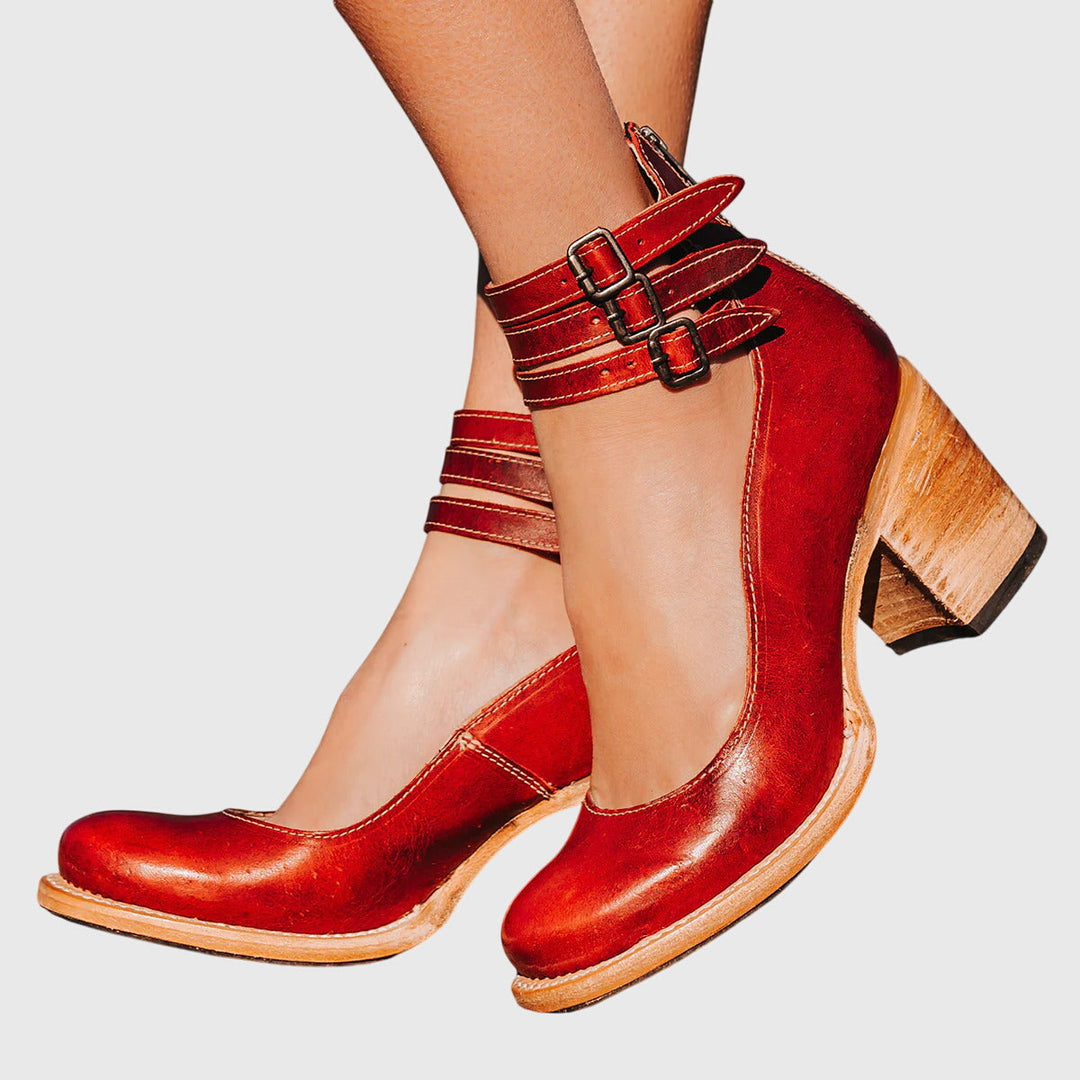 Versatile women's block heel ankle boots with chic cutouts & buckle. Ideal for everyday casual fashion.