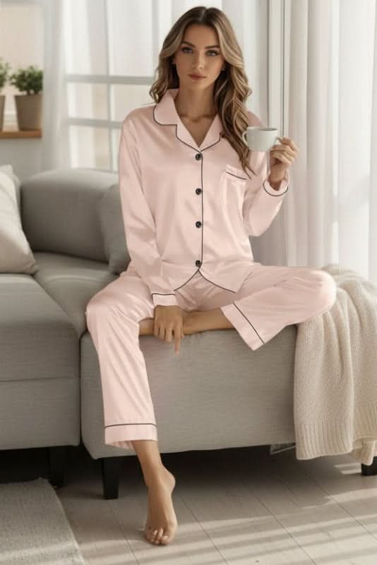 Woman relaxing in a soft, comfortable & chic women's pajama lounge set, perfect for home wear.