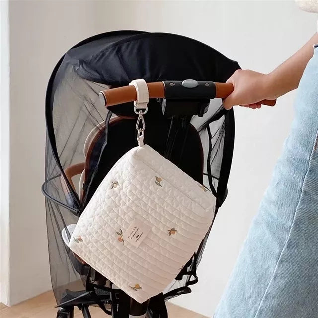 Versatile embroidered cotton hobo diaper bag, ideal for baby travel and newborn essentials.