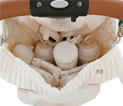 Stylish cotton embroidered hobo diaper bag for mom & baby essentials; features bear, tulip, olive prints.