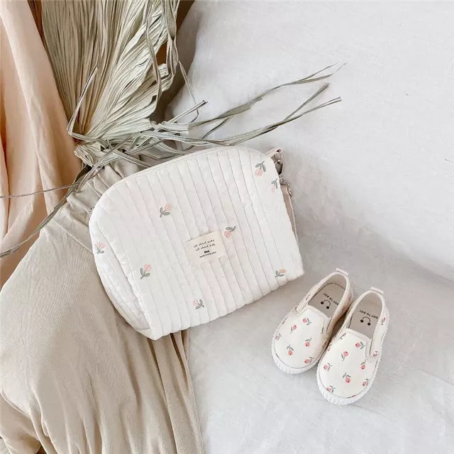 Stylish hobo mom bag, embroidered cotton, versatile for baby travel & carrying all newborn essentials.