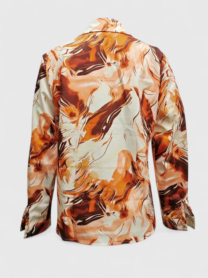 Versatile women's long sleeve blouse. Chic top for everyday wear, office attire, or special occasions. Elegant fashion.