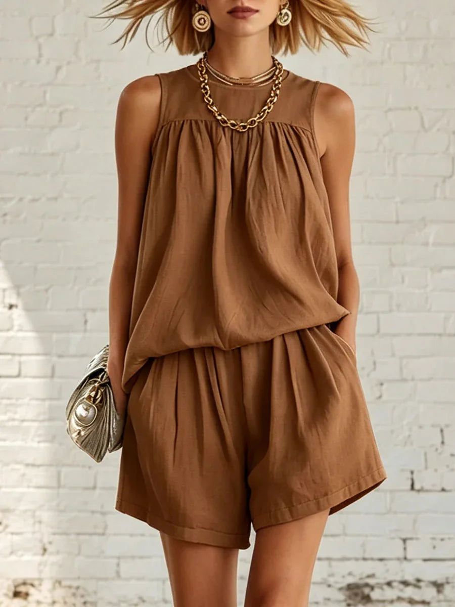 Women's sleeveless gathered top & high-waisted shorts. A comfortable and stylish two-piece summer casual set.