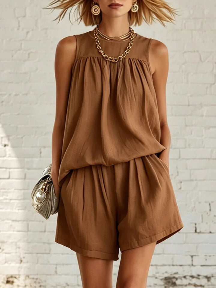 Women's sleeveless gathered top & high-waisted shorts. A comfortable and stylish two-piece summer casual set.