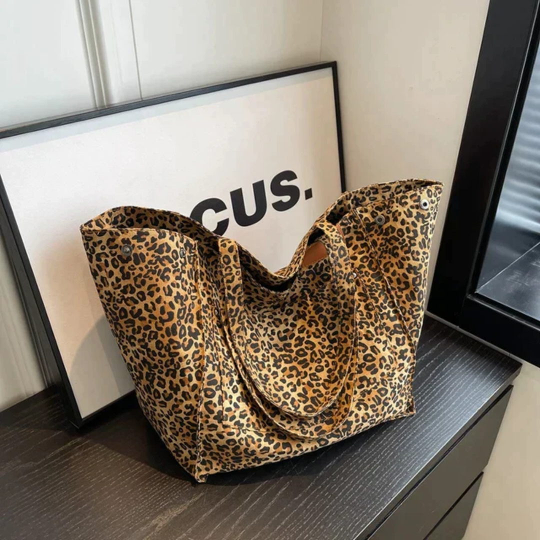 Women's chic leopard print shoulder bag, a stylish fashion accessory for everyday use.