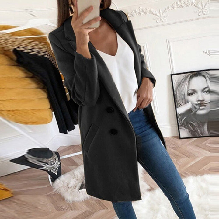 Women's chic long blazer coat, elegant versatile outerwear for sophisticated style.