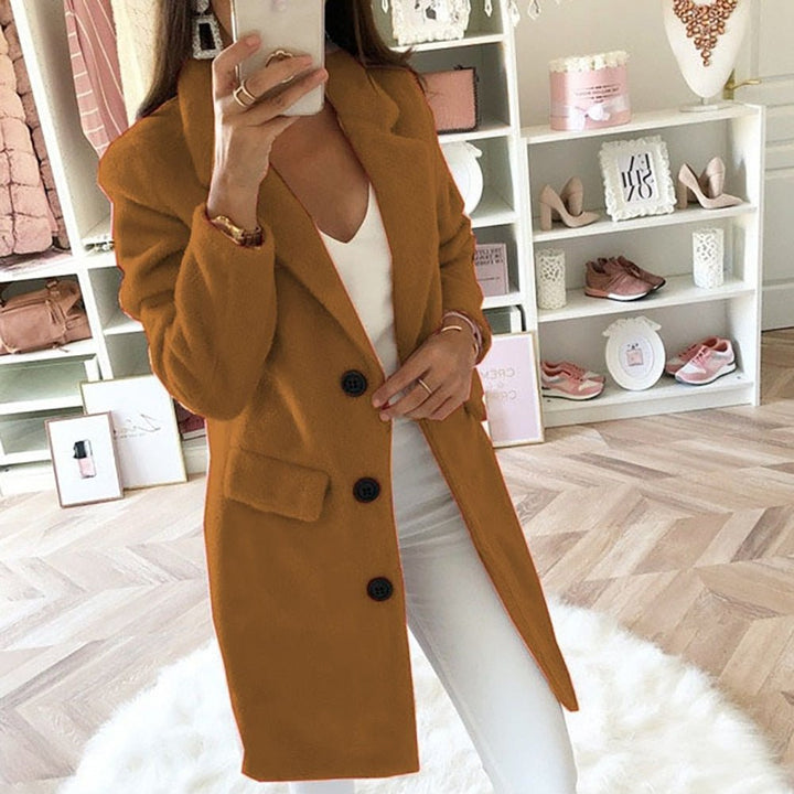 Elegant long blazer jacket for women, perfect for business casual and fall/winter fashion.