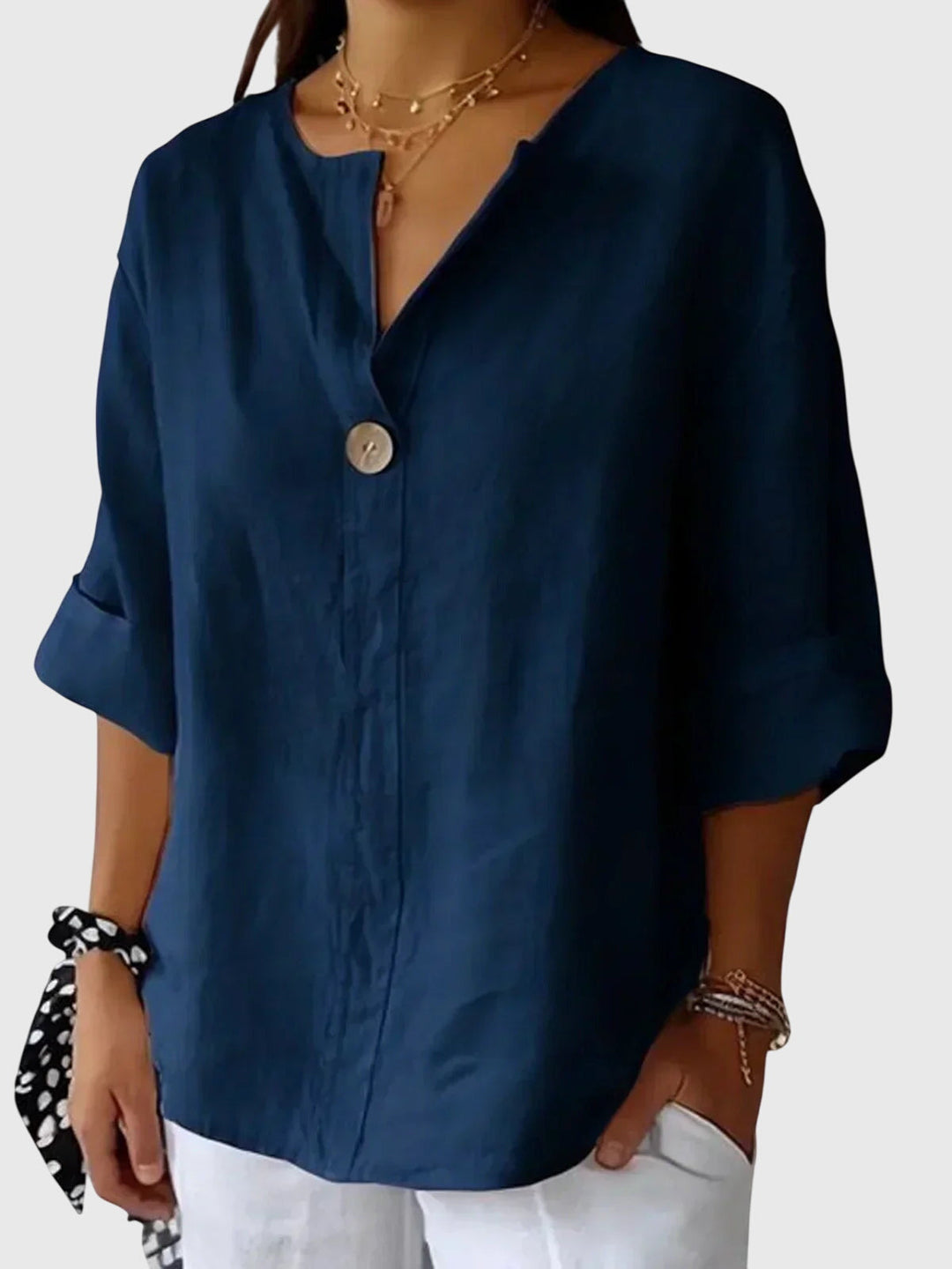 Modern women's long sleeve blouse with a flattering fit, perfect for everyday fashion.