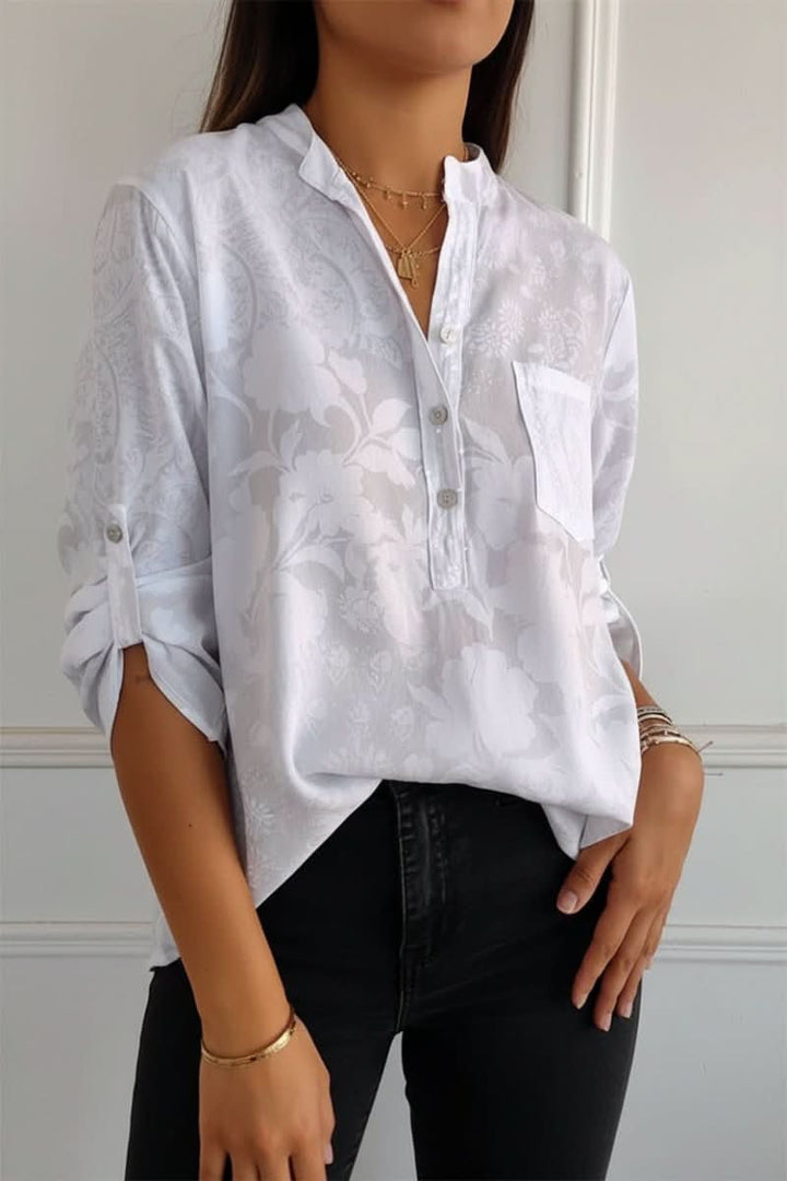 Stylish women's printed top featuring a unique pattern, loose fit, and long sleeves, perfect for casual outings.