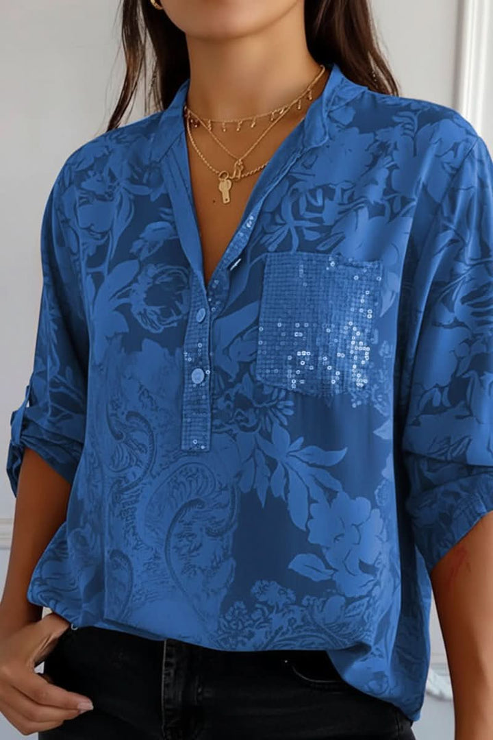 Comfortable long-sleeve women's blouse with a chic print, button-down front, and a handy chest pocket.