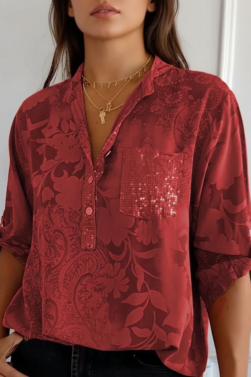 Flowy women's printed blouse, perfect for a chic look, with long sleeves, a button front, and a discreet pocket.