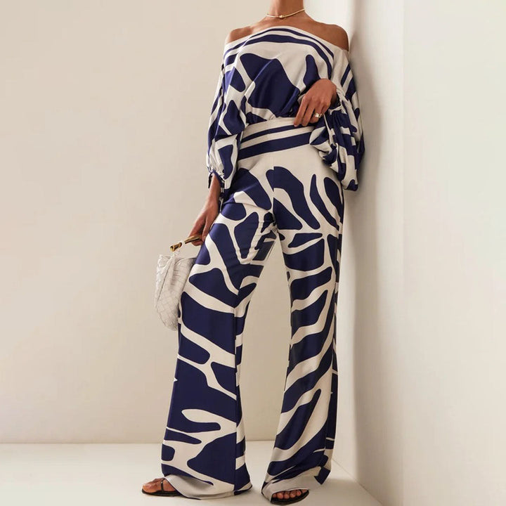 Modern women's fashion: Printed one-shoulder two-piece pants set with flowy wide legs, perfect for summer chic.