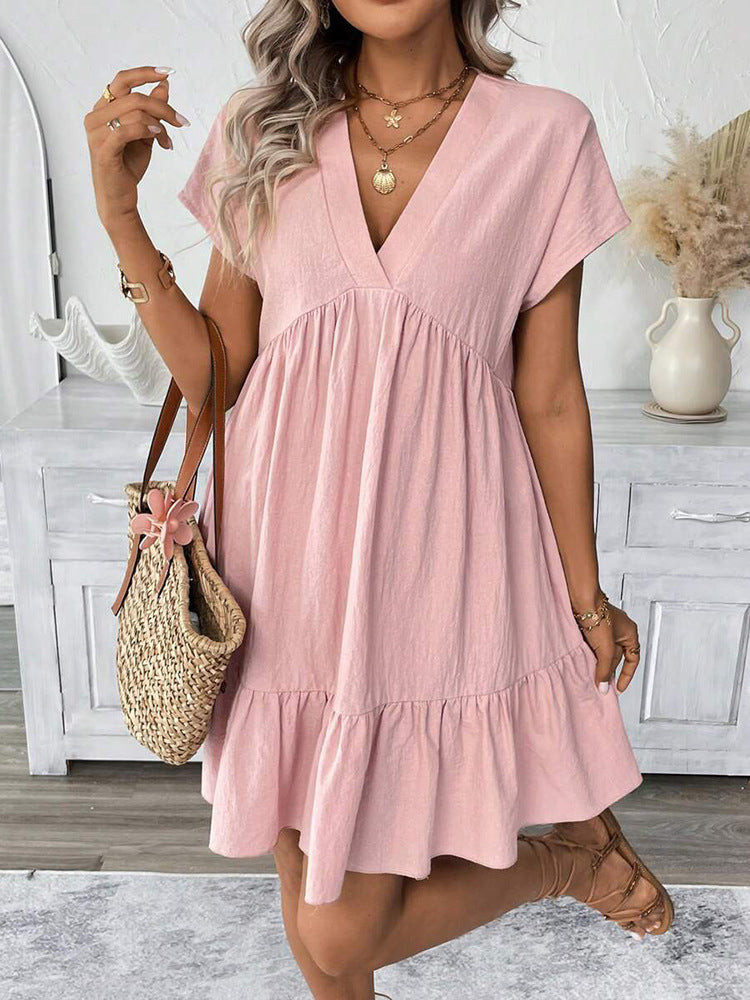 Lightweight women's chic summer mini dress, featuring a stylish ruffle hem and V-neck, great for holidays.