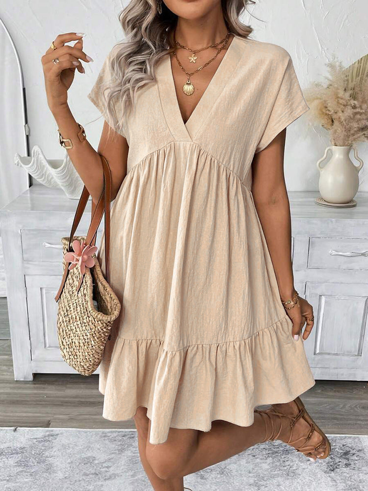 Stylish women's sleeveless mini dress, featuring a chic ruffle hem and V-neck, ideal for summer casual outings.