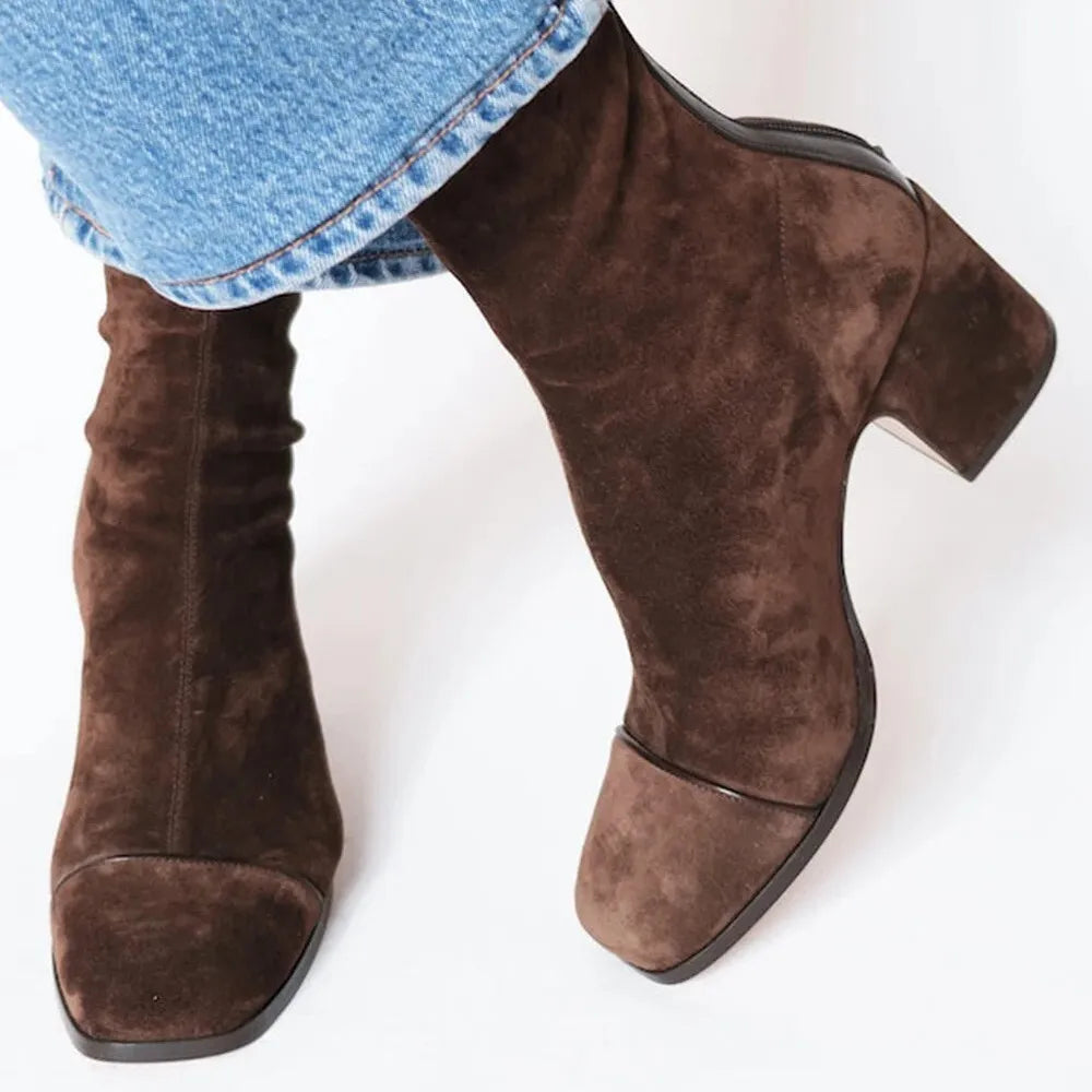 Women's chic square toe heeled boots with a stylish block heel, perfect for elevated style.
