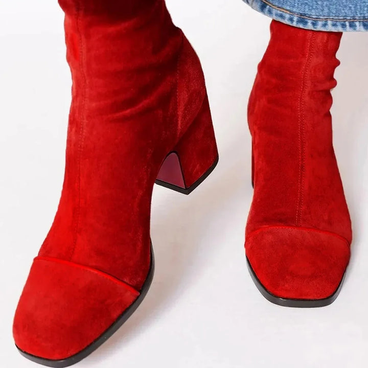 Elegant women's ankle boots featuring a trendy square toe and comfortable block heel for fall fashion.
