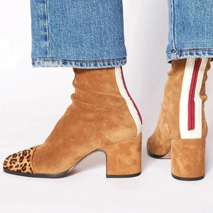 Versatile women's dress boots with a modern square toe and supportive block heel for elevated style.