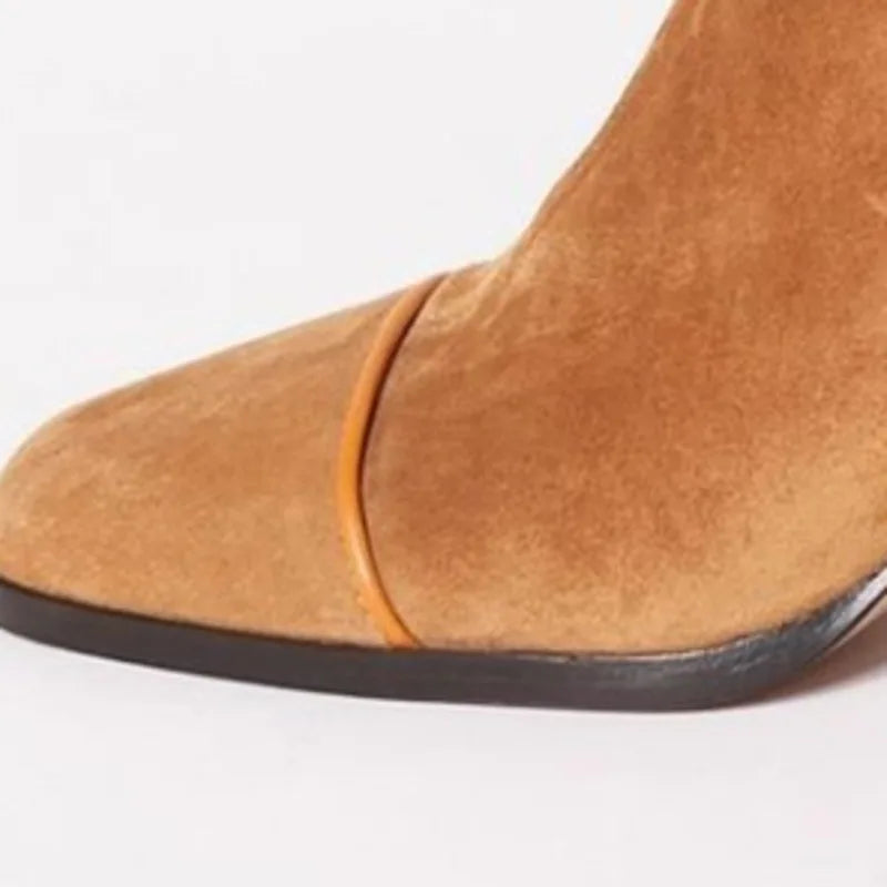 Trendy women's heeled boots, showcasing a sleek square toe and elegant design for fall fashion.