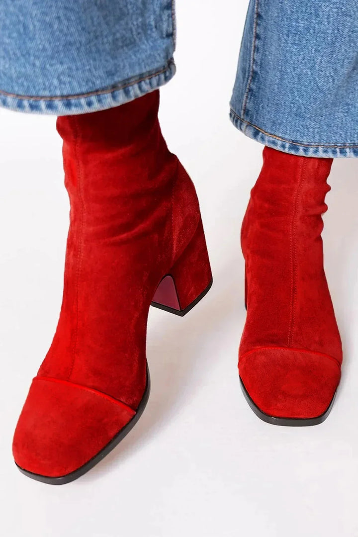 Elevate your look with these elegant women's square toe heeled boots, a versatile wardrobe addition.
