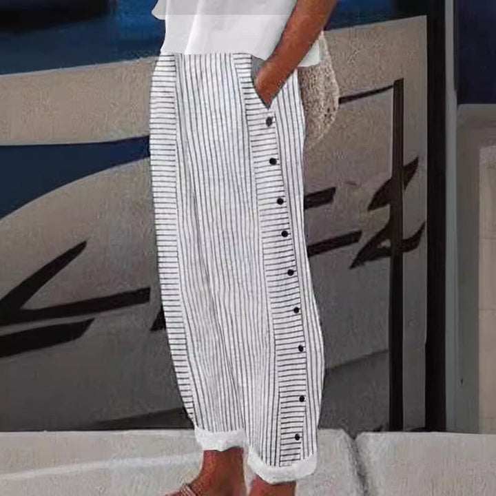 Women's chic striped pants with button accents, perfect for everyday style.