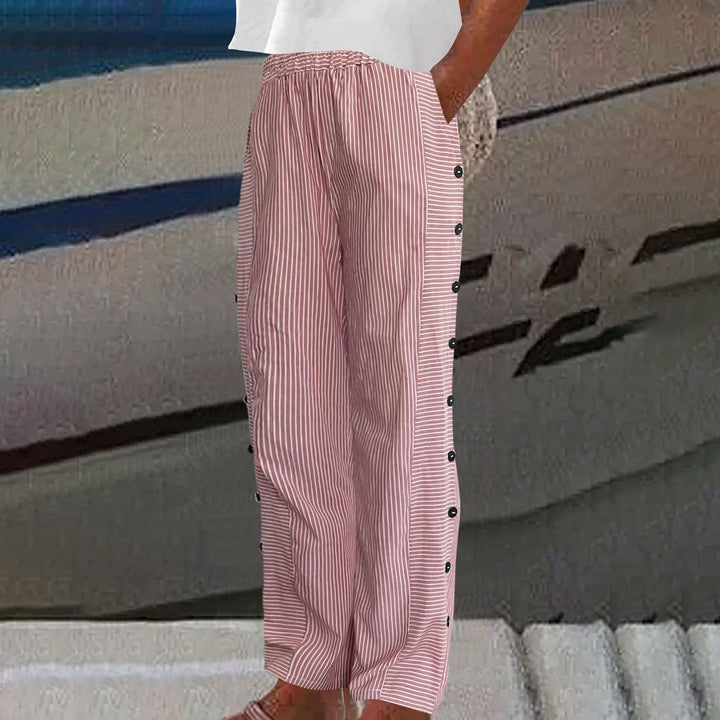 Chic women's striped pants, comfortable and versatile, with eye-catching button accents for everyday fashion.