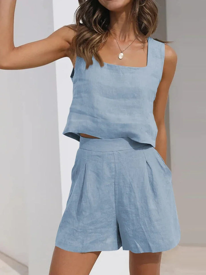 Chic women's crop top & shorts two-piece set, perfect summer loungewear or beach vacation outfit.