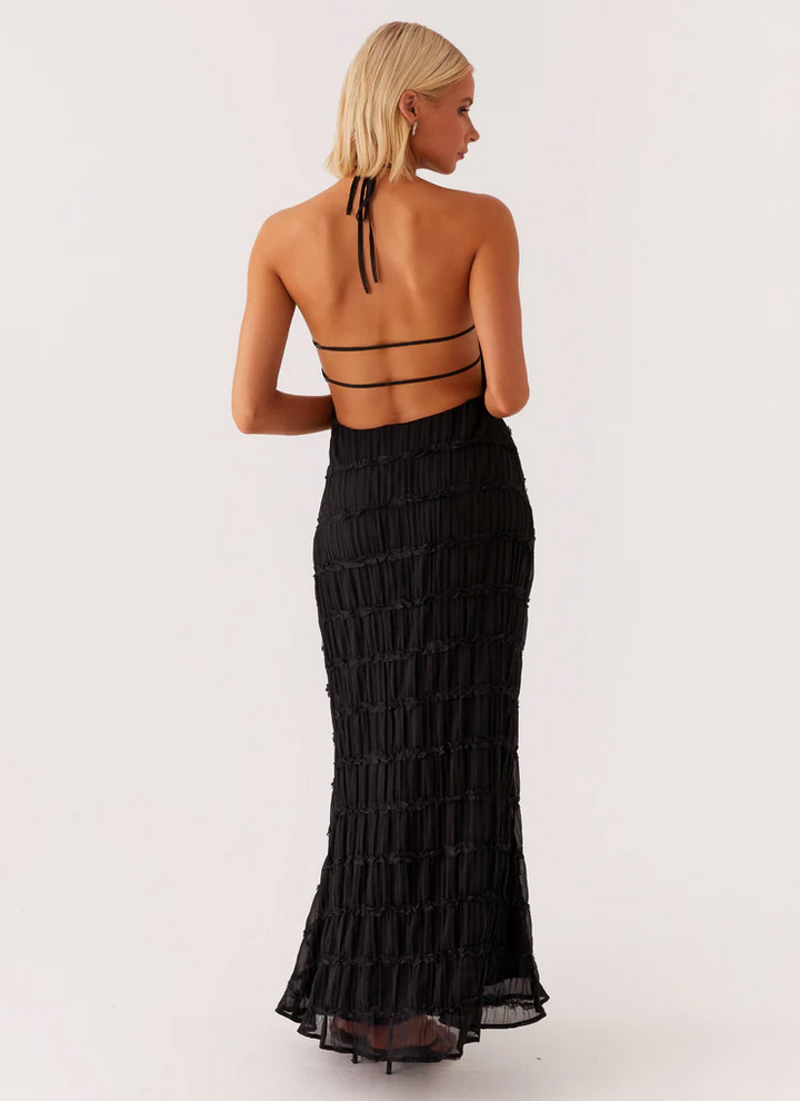 Elegant women's column maxi dress with a chic textured halter neckline, ideal for guests.