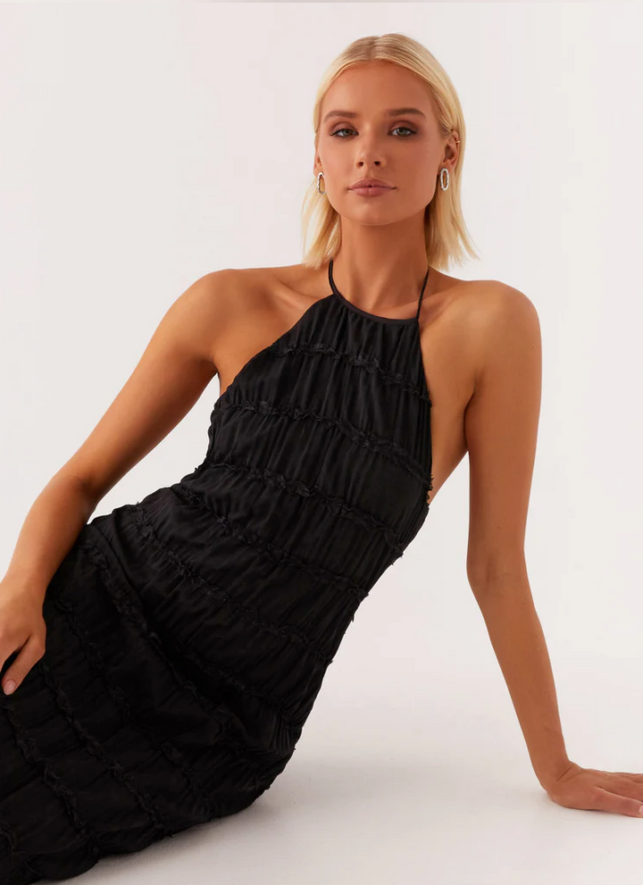 Chic textured halter maxi dress for women, an elegant choice for wedding guests.