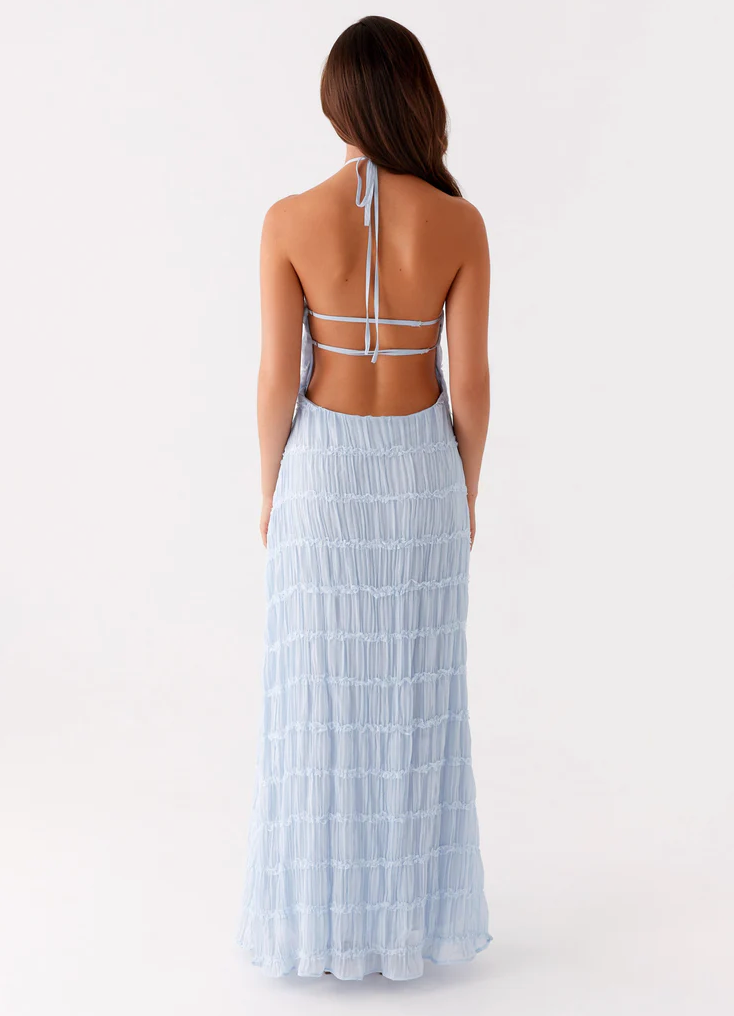 Elegant women's textured halter maxi evening dress, ideal for special occasions.