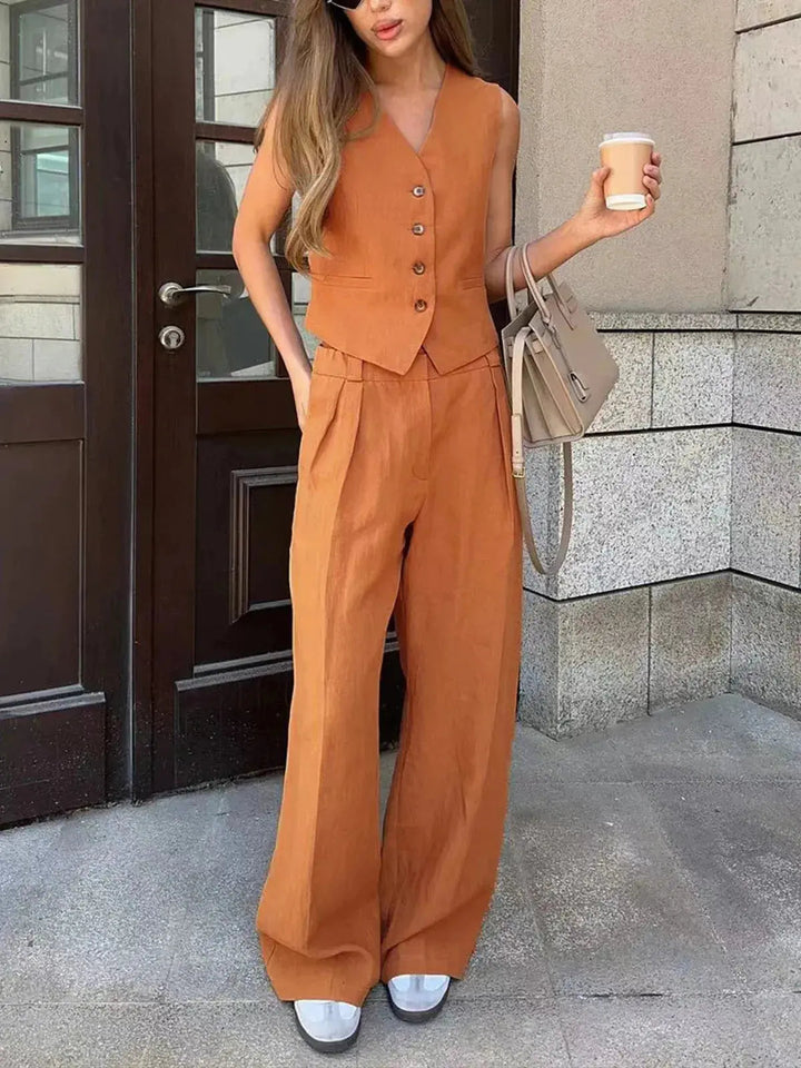 Elegant women's two-piece set featuring a tailored waistcoat and comfortable wide-leg trousers for versatile fashion.